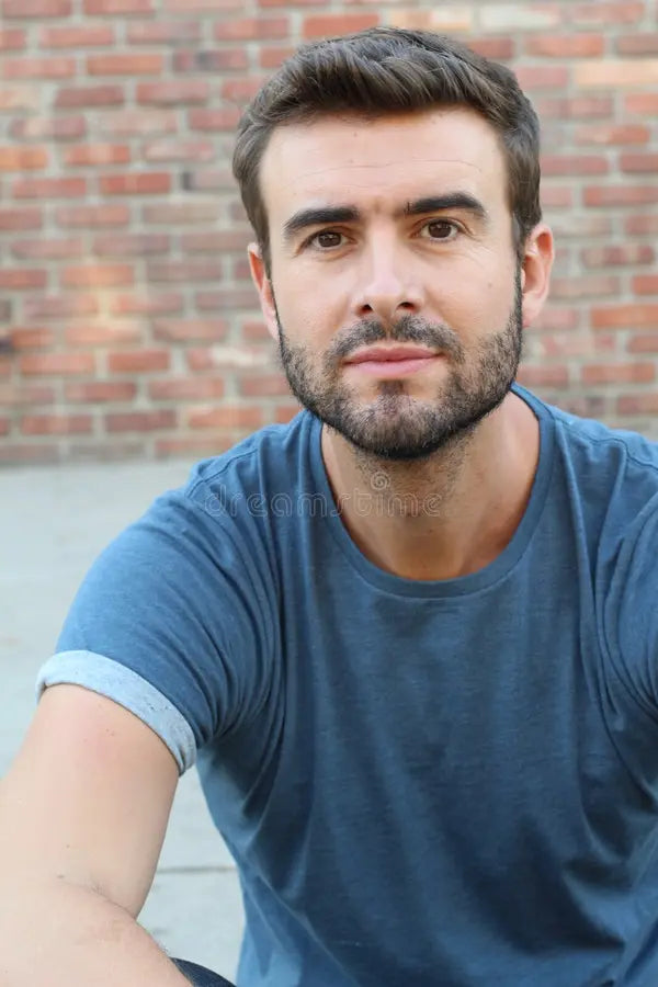 files/portrait-attractive-man-red-brick-wall-background-closeup-young-interesting-natural-sexy-male-80646268.webp